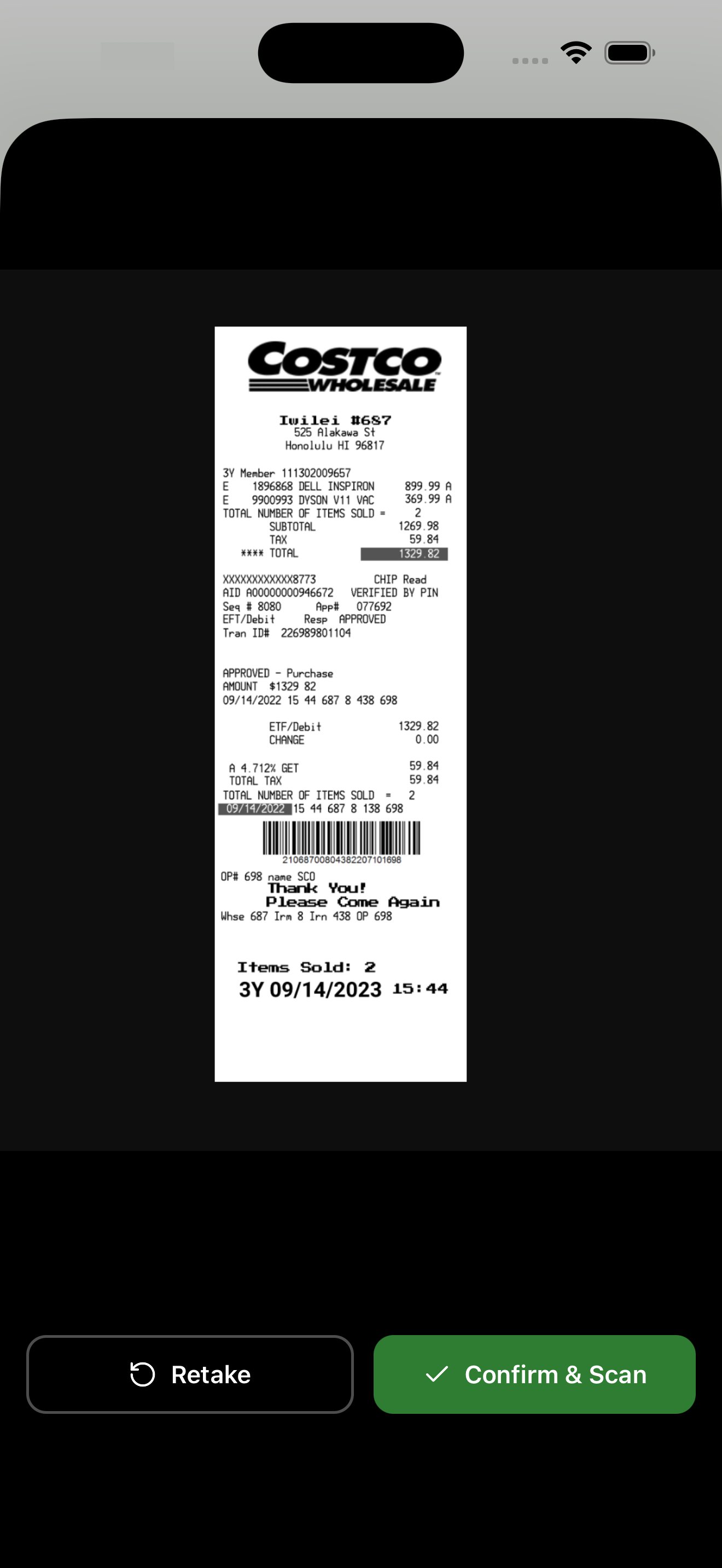 Camera scanning a Costco receipt with Retake and Confirm & Scan action buttons